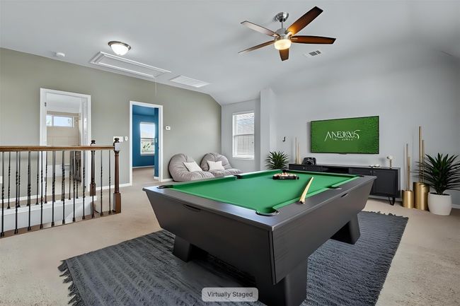 Game room featuring attic access, healthy amount of natural light, billiards, and ceiling fan | Image 6