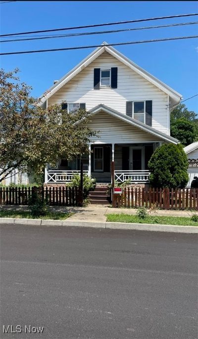 View of front facade with a porch | Image 1