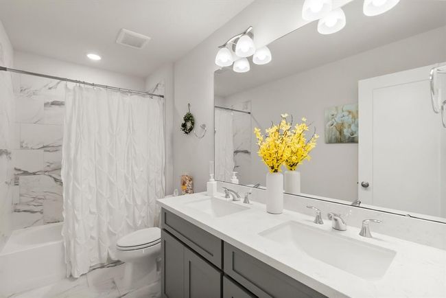 Upstairs bathroom offers two sinks! | Image 25