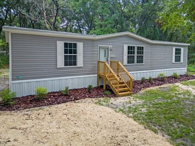 14331 Nw 77th Avenue, House other with 3 bedrooms, 2 bathrooms and null parking in Trenton FL | Image 2