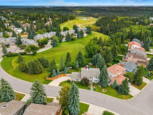 72 Woodacres Cres Sw, Calgary, AB, T2W4V6 | Card Image