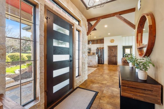 Entrance foyer featuring beam ceiling and recessed lighting | Image 5