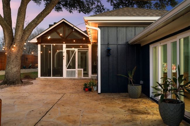 With its spacious layout and easy access to the rest of the yard, the patio becomes the perfect setting for outdoor gatherings, whether it's a casual BBQ or a quiet evening under the stars | Image 26