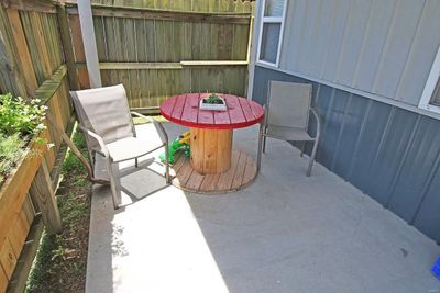 Front covered porch with a sitting area | Image 2