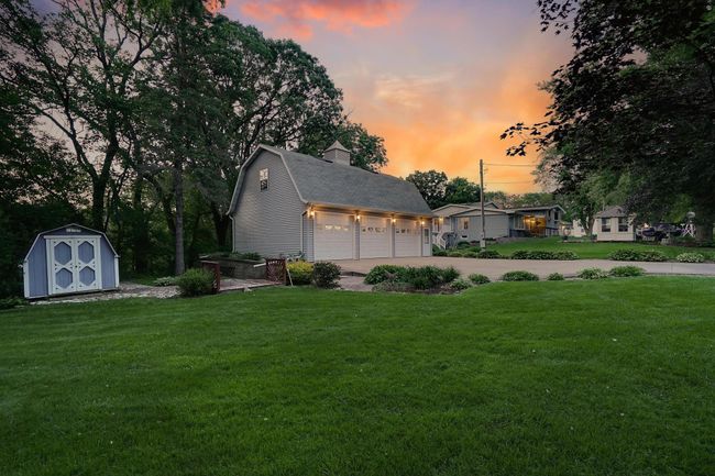 This fantastic garage/shop has heat, a/c, finished 2nd level loft with skylights, and is in addition to the 3 stalls attached to the home that are also heated with in-floor heat. | Image 6