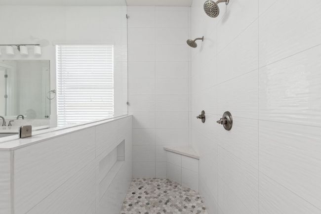 Full bathroom featuring a tile shower | Image 22
