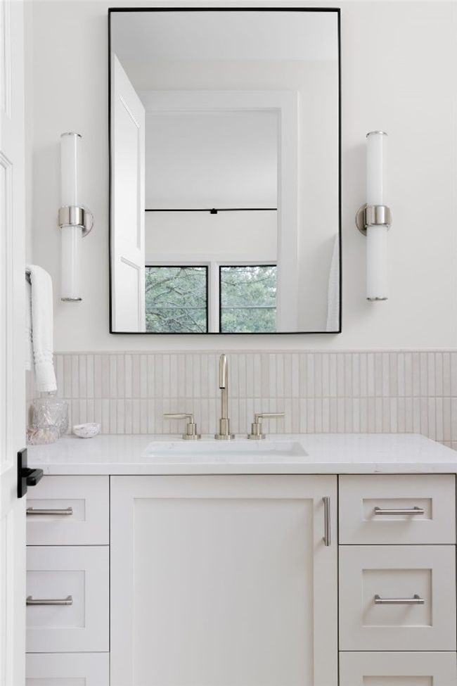 Bathroom featuring vanity and backsplash | Image 21