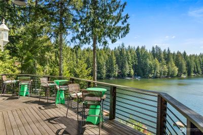 Breathtaking views from the oversized deck connected to kitchen and living space. | Image 1