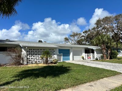 7101 Orange Avenue, Home with 5 bedrooms, 3 bathrooms and null parking in Cape Canaveral FL | Image 2