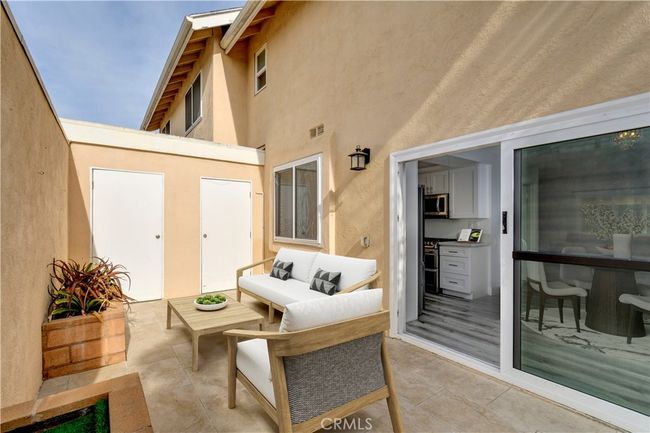 Virtually staged private patio with storage closet! | Image 21