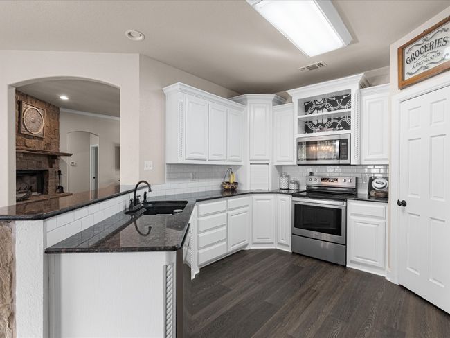 Loving those display shelves above the microwave | Image 9