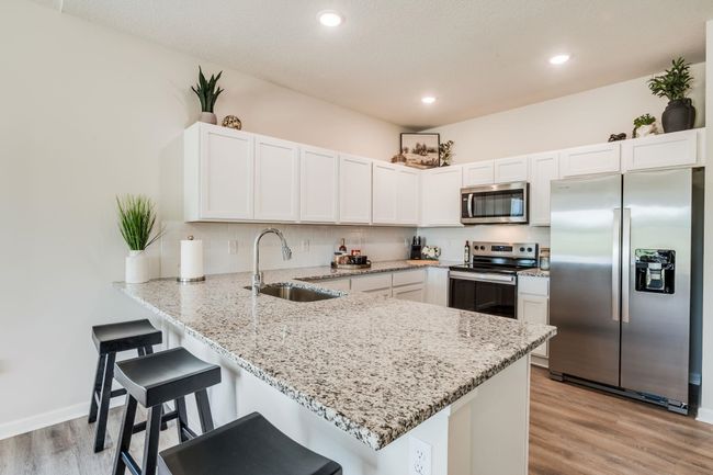 1412 N Sedgwick St, House other with 4 bedrooms, 2 bathrooms and null parking in Garden Plain KS | Image 13