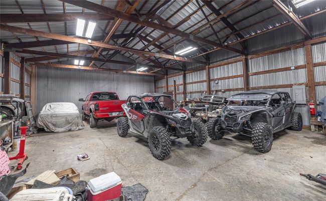 Garage featuring metal wall | Image 27