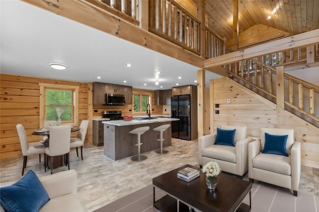 Virtual staged main level living area | Image 22
