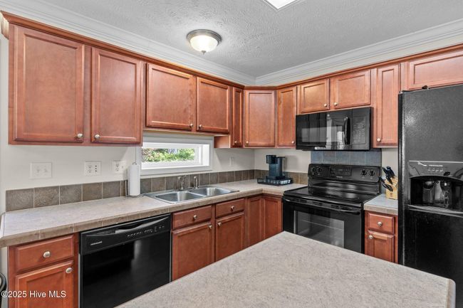 233 Ne 70 Th St, House other with 3 bedrooms, 2 bathrooms and null parking in Oak Island NC | Image 9