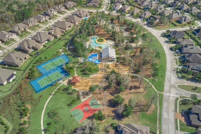 The 2nd community pool, tennis courts, basketball courts and playground. | Image 48