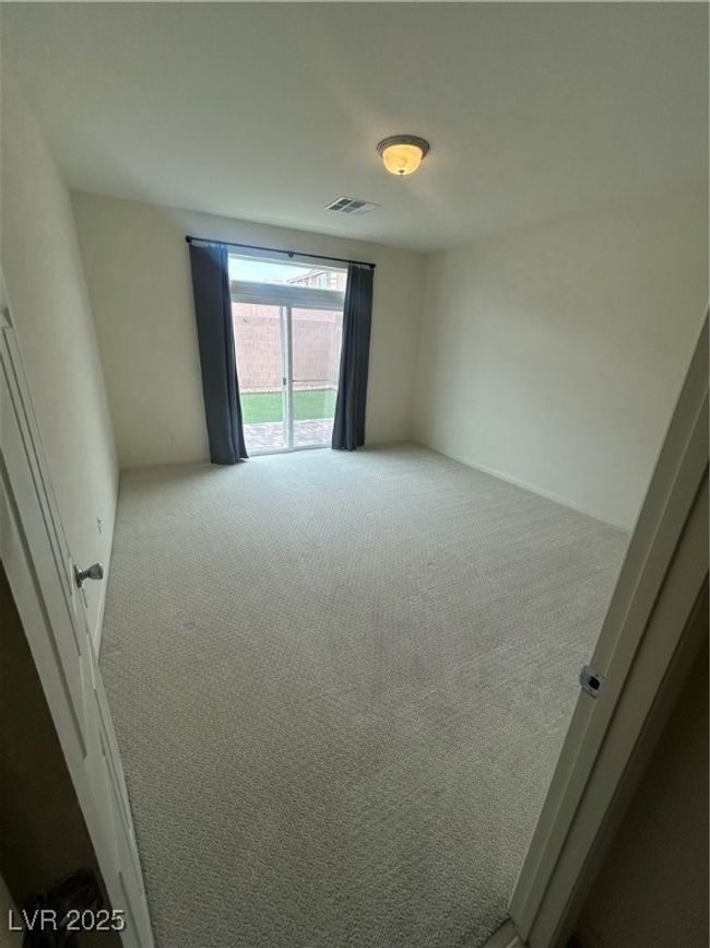 Unfurnished room featuring carpet floors | Image 7
