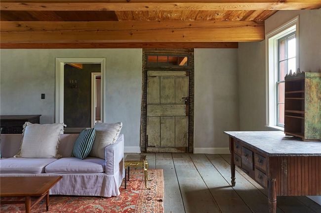Living room featuring wood-type flooring and wooden ceiling | Image 4