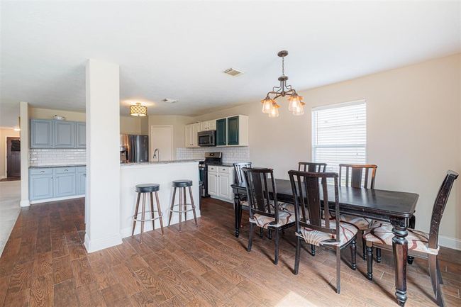 Breakfast area located off the kitchen. | Image 9