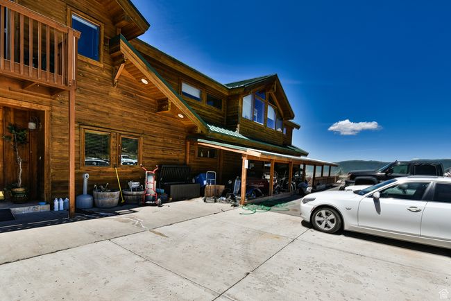 View of home's exterior featuring metal roof | Image 88