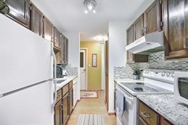 212 - 8604 48 Ave Nw, Condo with 2 bedrooms, 1 bathrooms and 1 parking in Calgary AB | Image 11