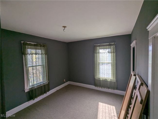 First-Floor View of carpeted empty room | Image 13