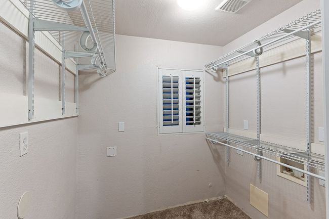 Spacious closet featuring carpet flooring | Image 27