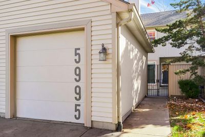 Entrance to property featuring a garage | Image 3