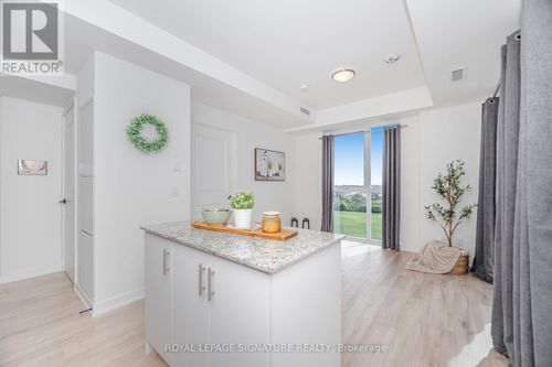906-335 Wheat Boom Drive, Oakville (JM Joshua Meadows), ON, L6G7Y1 | Card Image