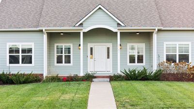 Property entrance featuring a lawn | Image 2