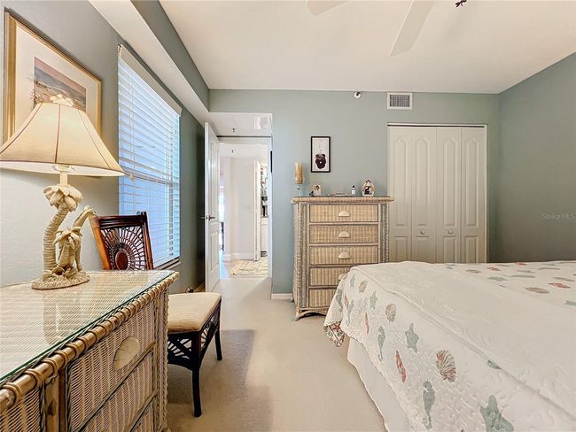 Second furnished bedroom has cozy carpet | Image 35