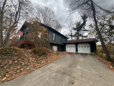 View of front of home with a garage | Image 1