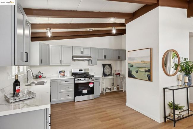 Stylish kitchen with sleek gray cabinetry | Image 12