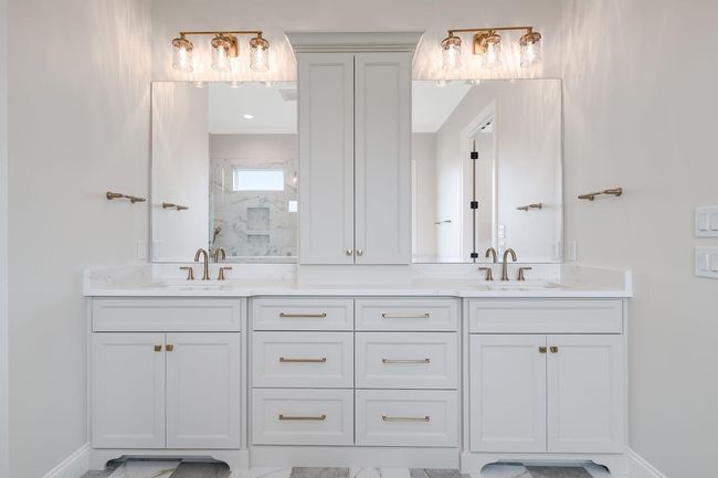 Full bathroom with a marble finish shower and double vanity | Image 30
