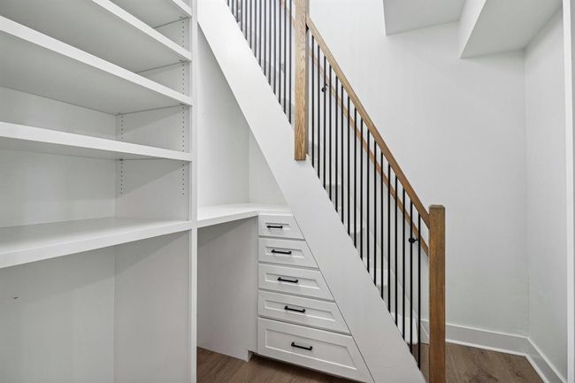 2 story primary closet with tons of built-ins ensuring organization and style | Image 19