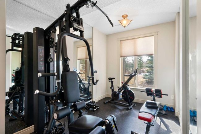 104 Grizzly Rise, House other with 6 bedrooms, 5 bathrooms and null parking in Cochrane AB | Image 34