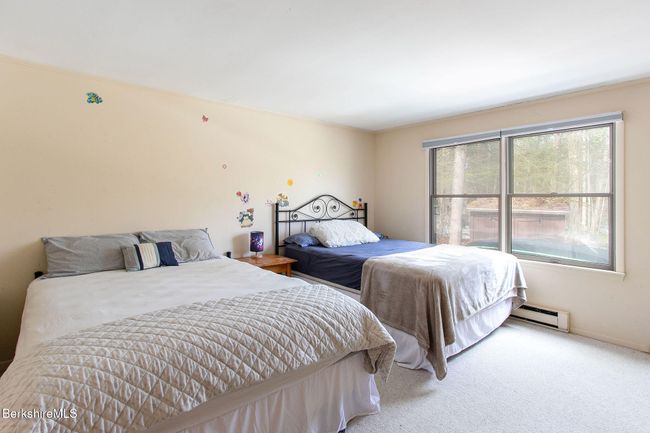 2nd primary bedroom with 2 closets, en suite bath with tub/shower | Image 20