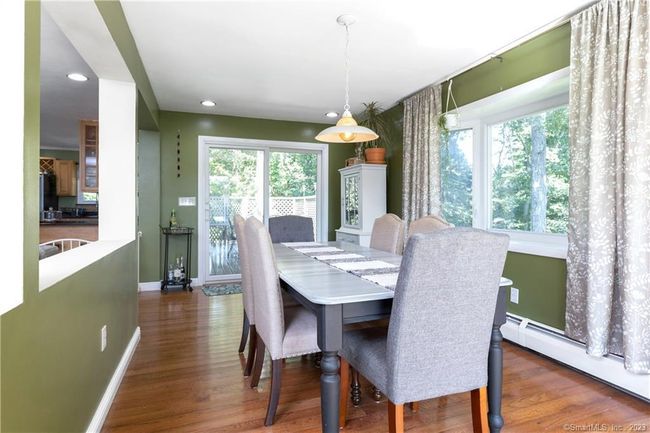 Dining Room offering Sliders to Back Deck, Large Picture Window | Image 8