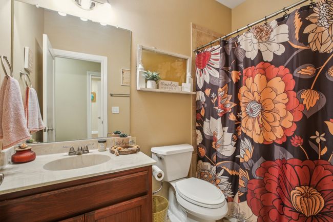 Bathroom featuring vanity and toilet | Image 23
