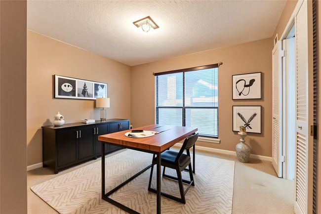 Study area located downstairs for convenience - virtually staged | Image 15