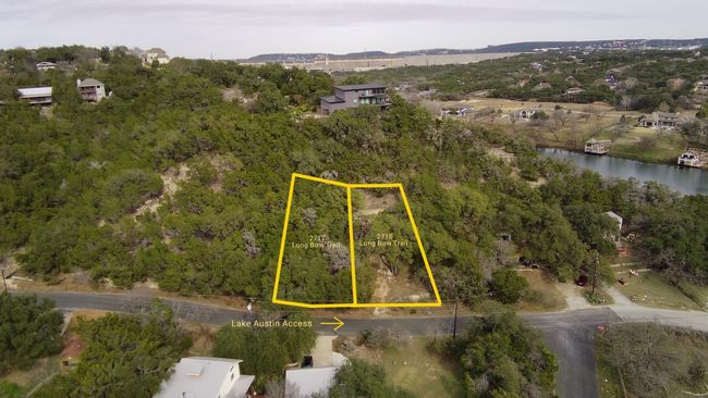 Aerial overview of property's location featuring property boundaries highlighted and a nearby body of water | Image 19