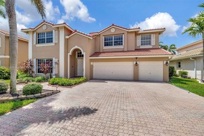 5646 Nw 108th Ter, House other with 4 bedrooms, 3 bathrooms and null parking in Coral Springs FL | Image 2