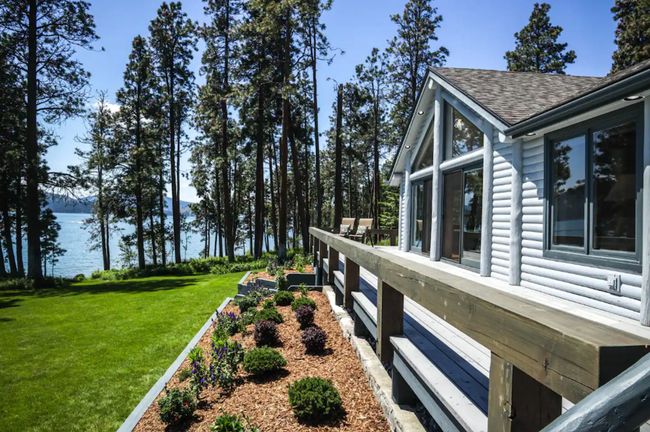View of yard with a water view | Image 11