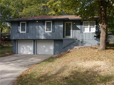 View of front of house featuring a garage | Image 1