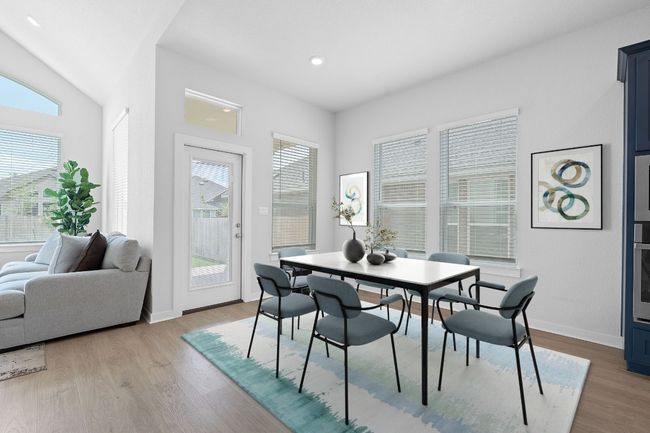 Dining room with baseboards, recessed lighting, and wood finished floors | Image 13
