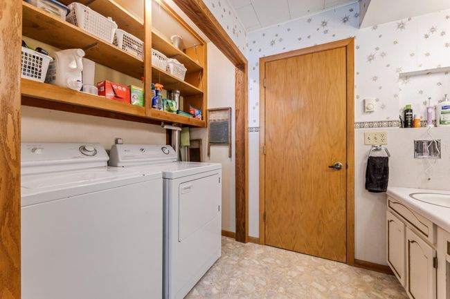 Main Level Washer & Dryer in the bathroom. | Image 17