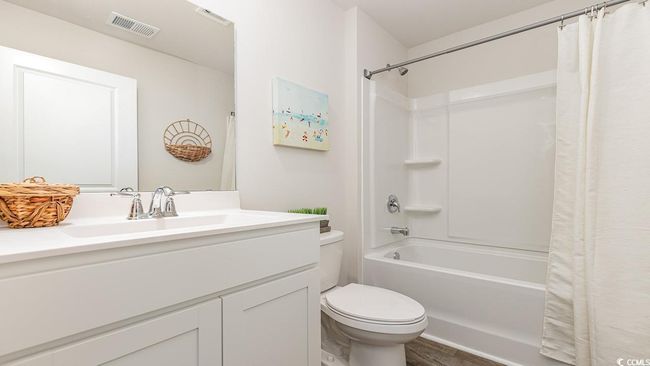 Full bathroom with shower / bath combo, vanity, and toilet | Image 20