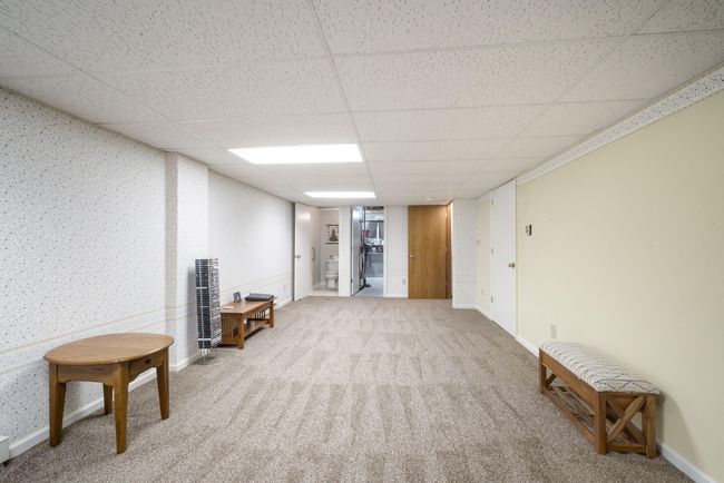 The Spacious Lower Level Includes a Finished Rec Area with Half Bath and Room to Expand! | Image 21