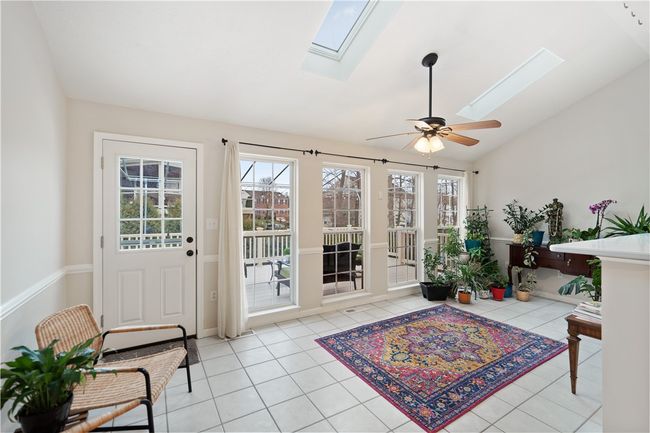 Skylights & large picture windows overlooking the party sized, maintenance free deck. | Image 10
