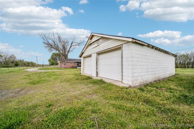 View of detached garage | Image 33